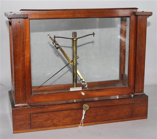 A set of mahogany cased chemists scales